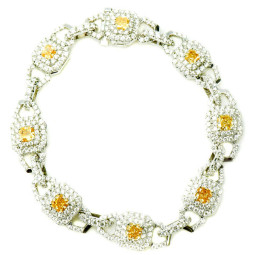 Orange Diamond Bracelet - (8)=1.95Radiant Orange Diamonds with (412)=3.15ct Melee White Diamonds. 18KW&Y= 21.47gr