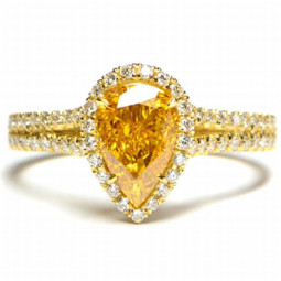 A 1.34ct Pear Shape Fancy Intense Yellow Orange Diamond.