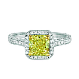 A 1.53ct Radiant Shaped Fancy Yellow, VS1 Diamond Set in 18K White Gold Ring