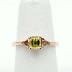 A 0.75 Fancy Vivid Yellow Diamond Set in a 14kt Pink Gold