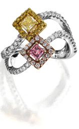 3 Mix Color Diamond Cocktail Ring with 0.10cts of pink diamond melee, 0.13cts of yellow diamond melee and 0.47cts of white diamond melee. Made in platinum.